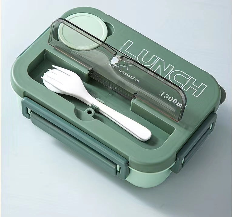 Microwaveable sealed lunch box with compartments and sauce box with cutlery