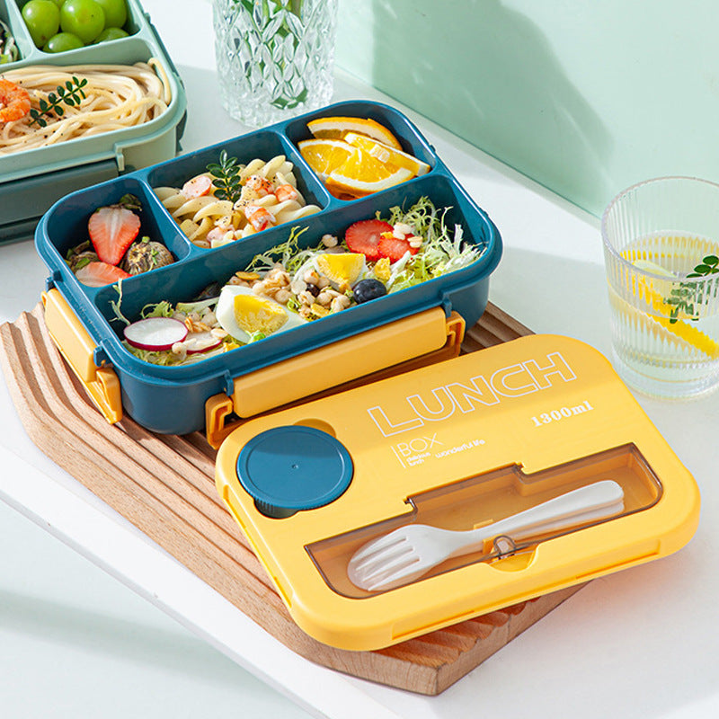 Microwaveable sealed lunch box with compartments and sauce box with cutlery